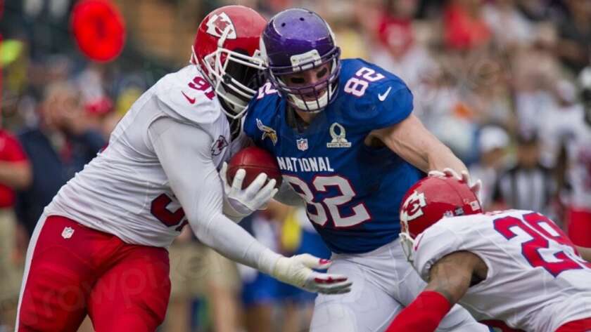 NFL players in full action on the field during a high-stakes game — 2026 NFL Draft rookies creating sharp betting value on props and futures