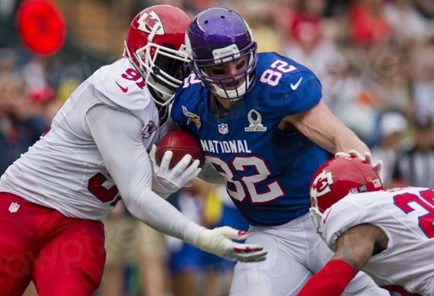 NFL players in full action on the field during a high-stakes game — 2026 NFL Draft rookies creating sharp betting value on props and futures